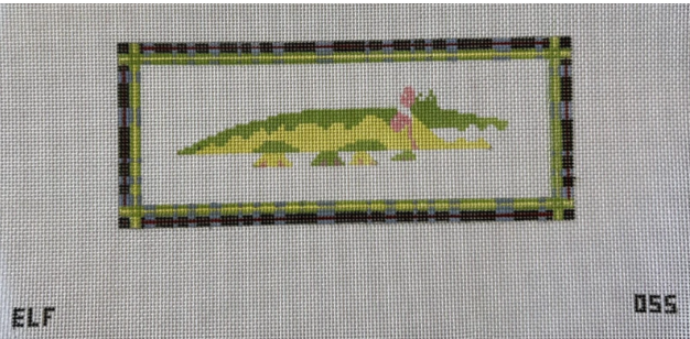 Alligator with plaid frame