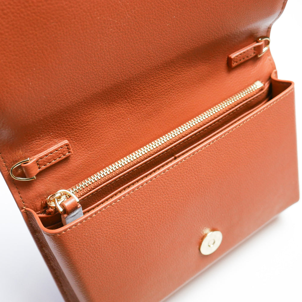 
                      
                        Brown Suede Self-Finishing Leather Clutch
                      
                    